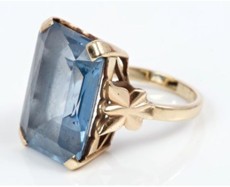 Gold (9ct) blue stone dress ring with a rectangular step cut blue stone in gold (9ct) setting.  Ring size K