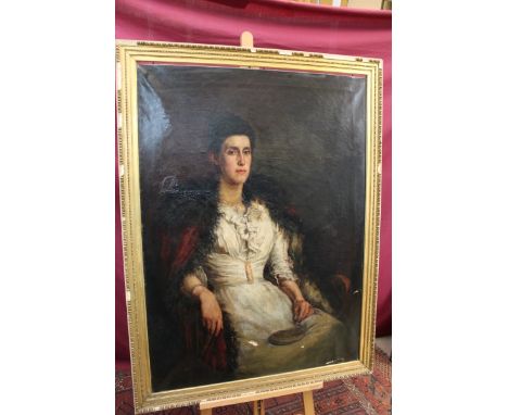 Frank Watson Wood (1862 - 1953), oil on canvas - portrait of an Edwardian lady seated in a chair, signed and dated, in gilt f