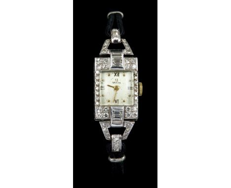 1930s ladies' Omega Art Deco white gold, baguette and brilliant cut diamond set cocktail watch with silvered dial, Arabic and