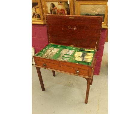 1920s part canteen of silver plated cutlery by Walker & Hall, in a Chippendale revival mahogany cabinet, comprising eleven ta