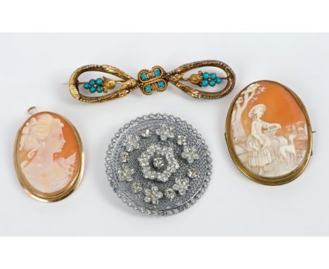 Victorian yellow metal and turquoise bow brooch, two oval carved shell cameo brooches and a costume brooch