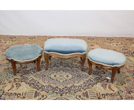 Pair of oval stools with blue upholstery, on cabriole legs and one other larger stool (3)
