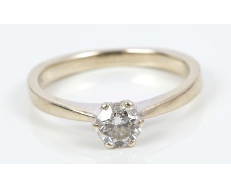 Diamond single stone ring with a brilliant cut diamond estimated to weigh approximately 0.40 carats, in six claw setting, on 