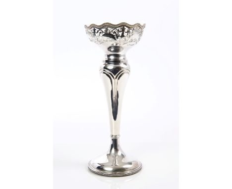 Early George V silver vase of inverted baluster form, with pierced decoration and bead border, on a domed pedestal foot with 