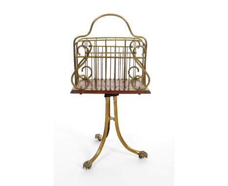Good quality Victorian brass and mahogany magazine rack on three splayed legs, claw feet and ceramic castors, 80cm high