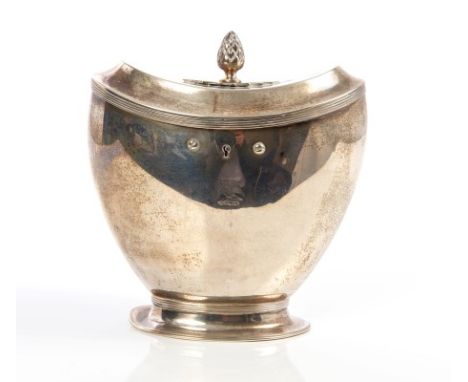 Early 19th century Dutch silver tea caddy of urn form, with reeded borders, fitted lock and engraved crest, shaped hinged cov