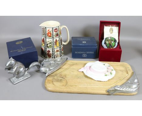 A hardwood and aluminium bread board, squirrel nut cracker and two boxed Bohemia crystal flower vases along with a Derbyshire
