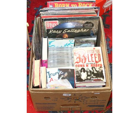 A box of L.P records, singles and compact discs mainly rock to include Black Sabbath, T.Rex and Rory Gallagher, along with bo