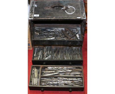 A lockable six drawer tool box of engineer's tools including taps and dies.