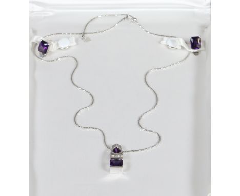A modernist 14 carat white gold, amethyst and diamond set necklace, pendant and earring set.