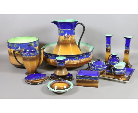 Fourteen pieces of Tunstall ceramics decorated with desert and Arab scenes to include jug and bowl, candlesticks, soap dish, 