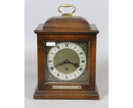 A mahogany cased presentation bracket clock with brass and silvered dial and Roman numeral markers by Smiths Clock & Watches 