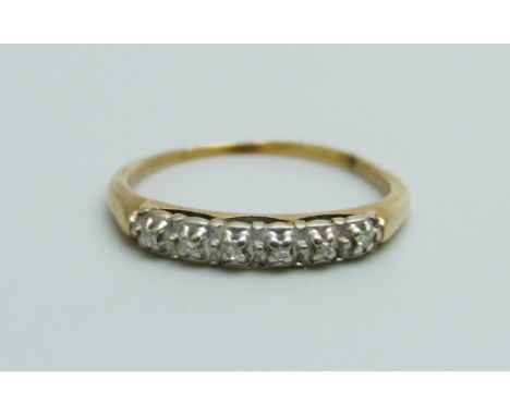 An 18ct gold ring set with six diamonds, 1.6g, N 