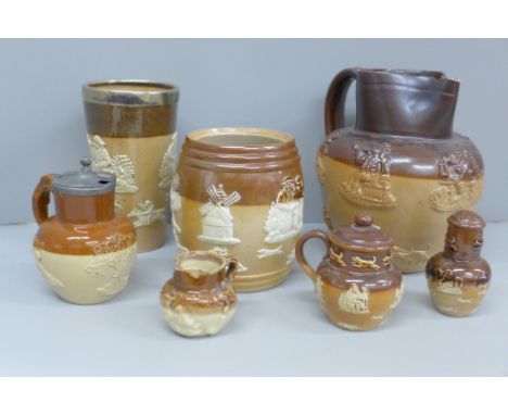 A Doulton saltglaze mustard jug, pepper pot, barrel, drinking vessel, hunting jug T. Smith London and two other jugs (7) 