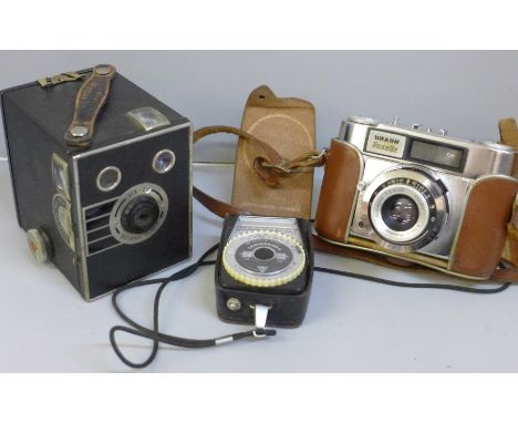 A Brownie box camera, one other Paxette and a light meter 