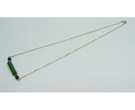 A 9ct gold necklace with jade and onyx detail, 2.4g, 36cm 