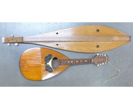 An Italian mandolin and a handmade wooden Dulcimer 