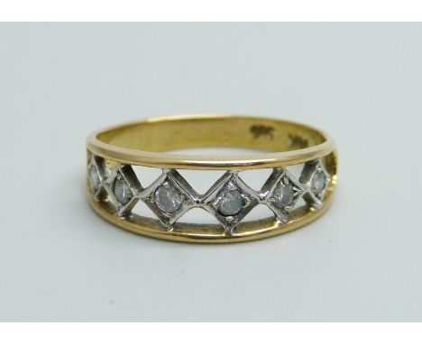 A 14ct gold ring set with six diamonds, 2.1g, L 