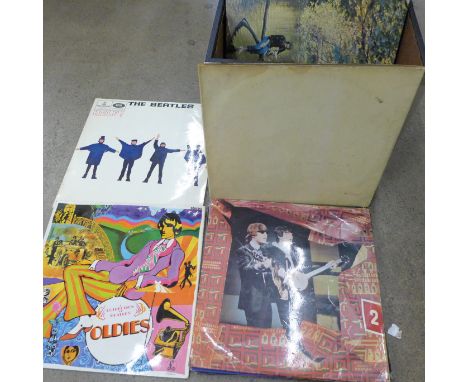 Eighteen The Beatles and related LP records including numbered White Album, (top opening) and Help! first pressing and a hand