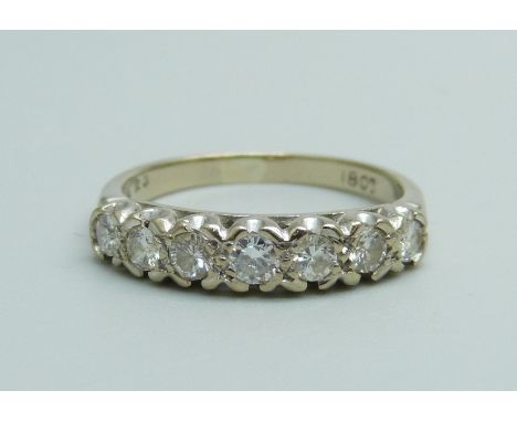 An 18ct gold, seven stone diamond ring, 3.7g, P 