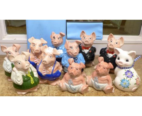Two sets of Natwest piggy banks, with a used cheque book and information leaflet, piggy bank card, etc., (10), together with 
