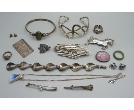 A collection of silver jewellery; a hallmarked modernist style stone set brooch, a hallmarked Tonie Taylor for Tarratt horse 