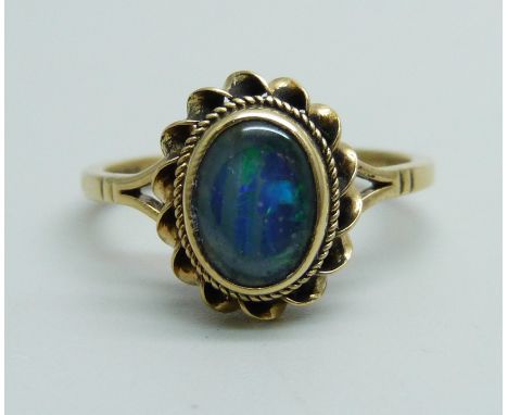 A 9ct gold black opal doublet ring, 2.7g, O 