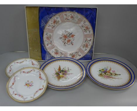 Two Royal Worcester plates decorated with sprays of flowers, a Coalport cake plate, boxed and two other hand painted side pla