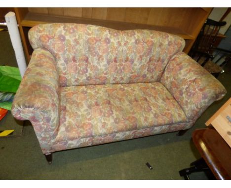 Edwardian 2 seater sofa upholstered floral fabric on mahogany legs to castors 70 x 145 cm 