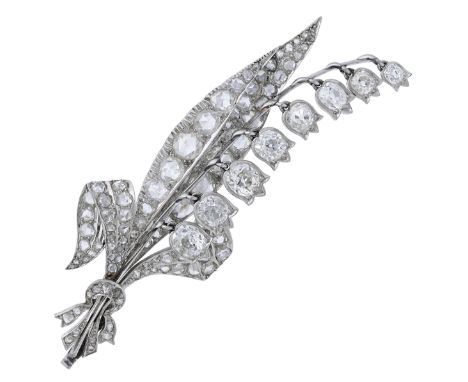 A late 19th century American lily of the valley diamond spray brooch, by J. E. Caldwell & Co., the realistically designed Lil