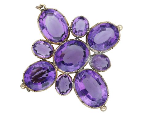 A 19th century amethyst brooch, the cross set throughout with oval-cut amethysts in pinched collet settings, gold mounted, le