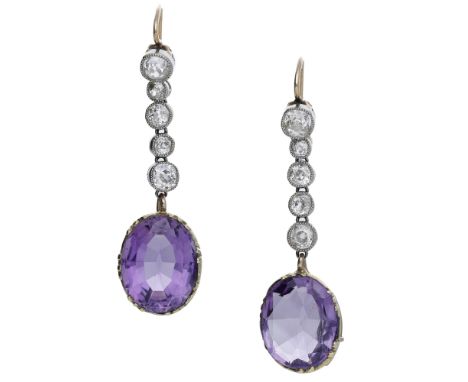A pair of antique amethyst and diamond convertible earrings, each set with a row of old-cut diamonds leading to detachable ov