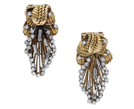 A pair of diamond set earrings, the ropetwist surmounts above a pierced fan-shaped drop with wirework centre, set throughout 