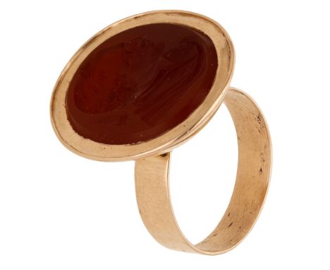 A late 18th century gold mounted carnelian intaglio seal depicting Sir Isaac Newton, later adapted to a ring, the intaglio de