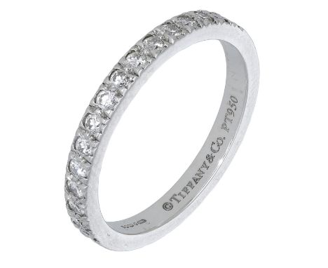 A platinum and diamond ‘Novo’ half eternity ring by Tiffany & Co., set to the front with a row of brilliant-cut diamonds, Lon