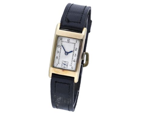 Swiss. A gold rectangular wristwatch, circa 1936 Movement: manual winding, 15 jewels. Dial: silvered, Arabic numerals, subsid