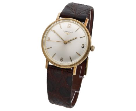 Longines. A gold wristwatch, circa 1970. Movement: manual winding. Dial: silvered, applied Arabic and baton indexes, centre s