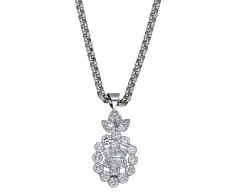 A diamond cluster pendant, the pierced pendant set throughout with brilliant-cut diamonds and centred with a principal marqui