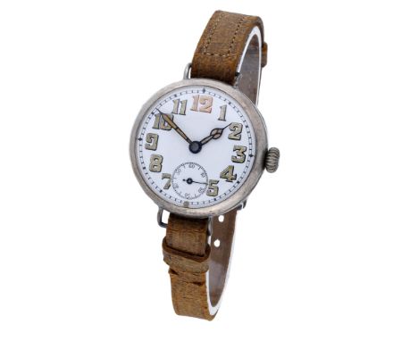 Swiss. A silver trench watch, circa 1915. Movement: manual winding, lever escapement. Dial: white enamel, Arabic numerals, su