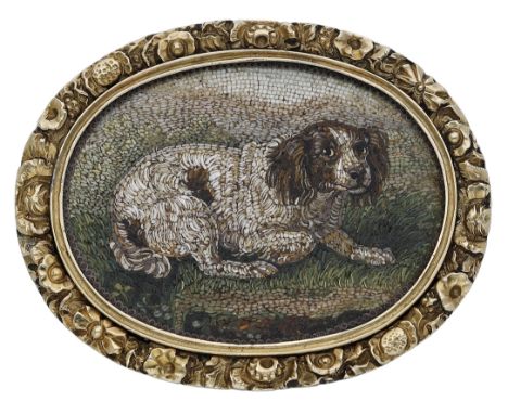 An Italian micromosaic, Rome, circa 1800, depicting a recumbent brown and white spaniel, within a grassy landscape, with tree