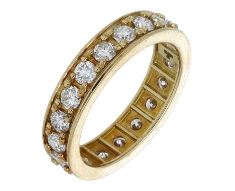 An 18ct yellow gold diamond eternity ring, claw-set throughout with brilliant-cut diamonds, Sheffield assay mark, total diamo