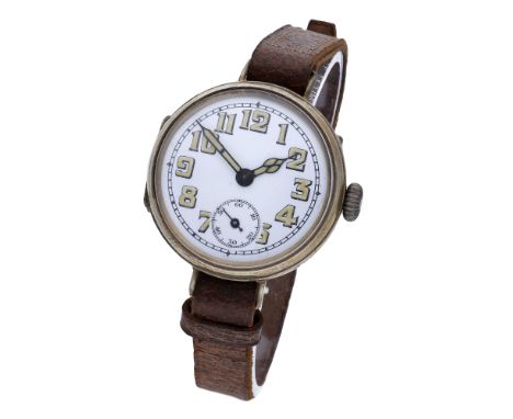 Swiss. A silver-gilt trench watch, circa 1917. Movement: manual winding, lever escapement. Dial: white enamel, Arabic numeral