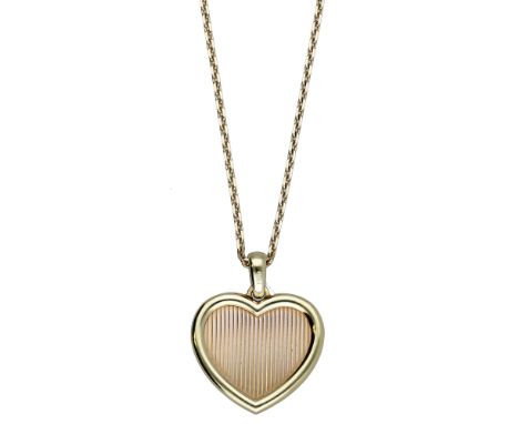 An 18ct gold heart pendant on chain, retailed by Fred, the bicolour pendant with plain polished border and reeded ground, sig