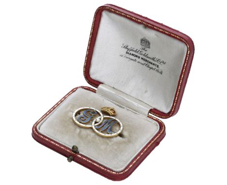 An early 20th century Royal Cypher brooch for King George V and Queen Mary, the pale blue enamelled initials within intersect