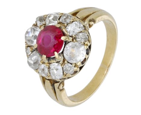 A synthetic ruby and diamond cluster ring,  the central stone within a border of old-cut diamonds, (one replaced with white p