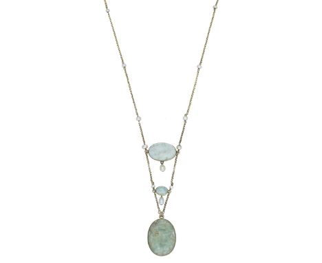 An Arts and Crafts emerald and pearl necklace, early 20th century, the fine gold cable-link chain interspersed with seed pear