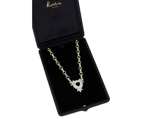 A diamond necklace, the fancy-link 18ct gold chain leading to an openwork triangular-shaped frontispiece set throughout with 