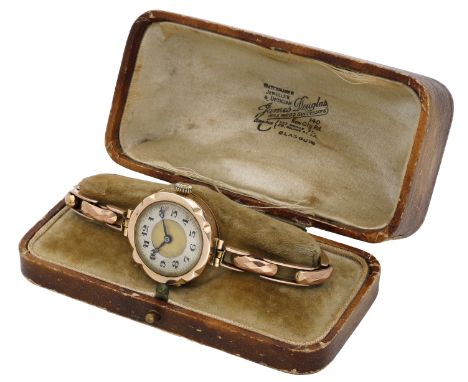 Swiss. A lady’s gold wristwatch with gold expandable bracelet, circa 1920. Movement: manual winding. Dial: silvered chapter r