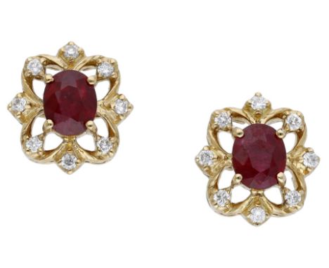 A pair of diamond and ruby ear studs, the oval mixed-cut rubies in openwork setting, with brilliant-cut diamond highlights, p
