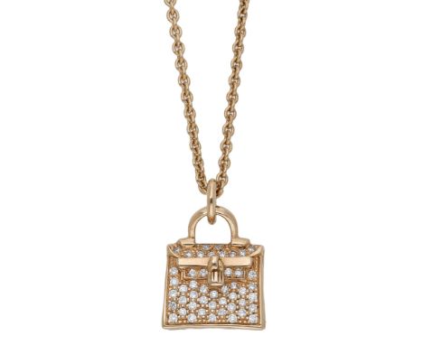 An 18ct rose gold Kelly Amulette pendant on chain by Hermès, realistically modelled as a Hermès ‘Kelly’ handbag, the pendant 